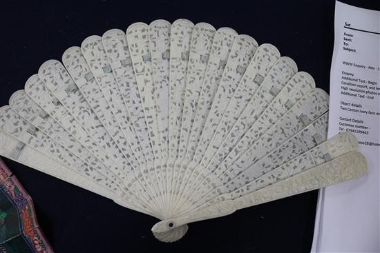 Two Canton ivory fans and a silver and ivory page turner, late 19th/early 20th Century